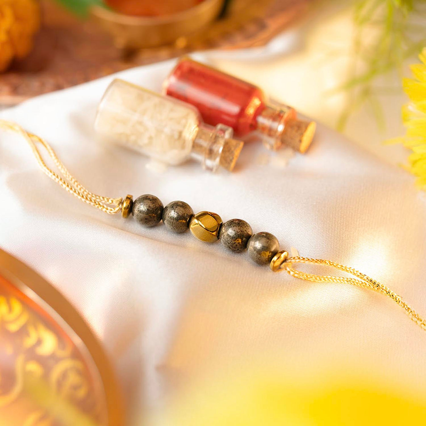 Mesmerize Rakhi Collection – 11 Chakra, Ruby & Spiritual Rakhis for ...