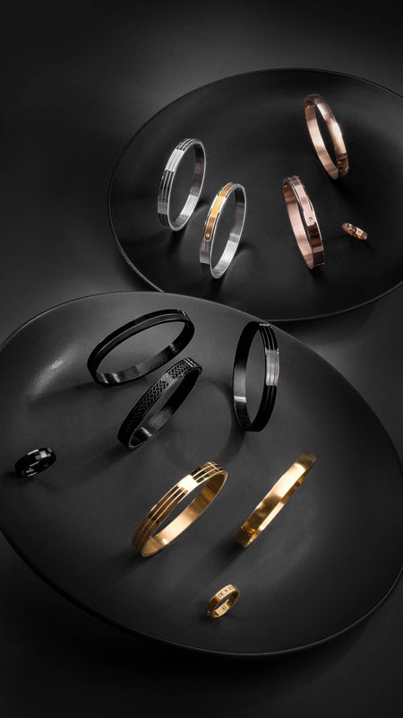 Mens Jewellery in gold, rose gold, silver and black. Bracelets and rings.